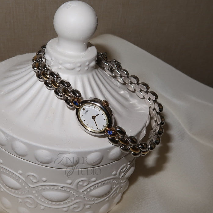 Vintage Seiko 1F20-5B20 Two-Tone Blue Accent Jewellery Watch — 1990s