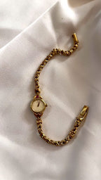 Vintage Seiko 1E20-0430 Ruby Accent Gold Bracelet Watch — Circa 1986